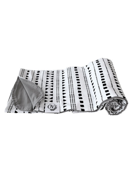 the OVer Company Jersey Knit Reversible Swaddle 🇨🇦